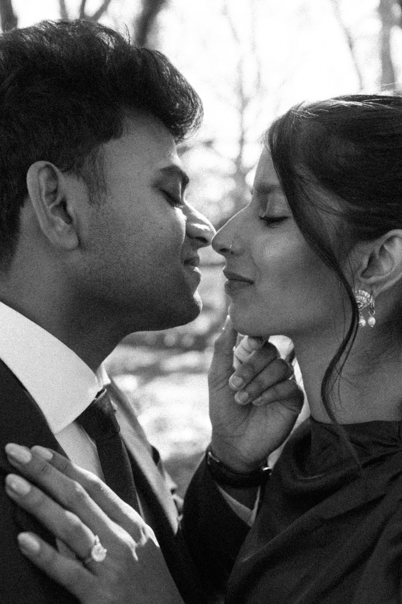 An intimate wedding moment in black and white